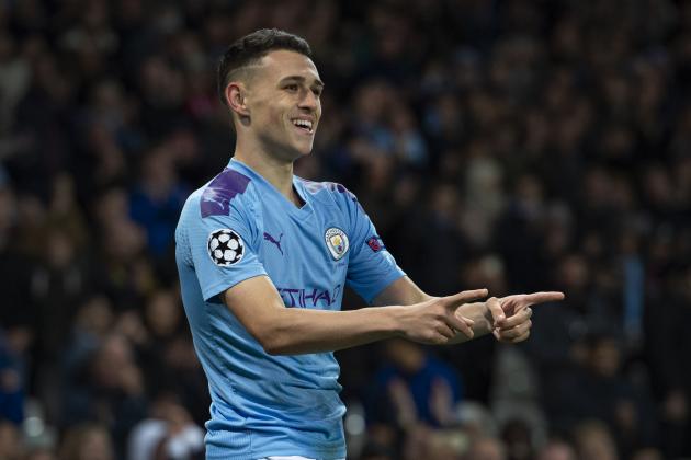 MANCHESTER, ENGLAND - OCTOBER 01: Phil Foden of Manchester City celebrates scoring with team mates Raheem Sterling and Joao Cancelo eduring the UEFA Champions League group C match between Manchester City and Dinamo Zagreb at Etihad Stadium on October 01, 2019 in Manchester, United Kingdom. (Photo by Visionhaus)