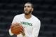 Boston Celtics' Jayson Tatum warms up before a preseason NBA basketball game against the Charlotte Hornets in Boston, Sunday, Oct. 6, 2019. (AP Photo/Michael Dwyer)