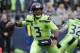 Seattle Seahawks quarterback Russell Wilson drops back to pass against the Los Angeles Rams during the first half of an NFL football game Thursday, Oct. 3, 2019, in Seattle. (AP Photo/Elaine Thompson)