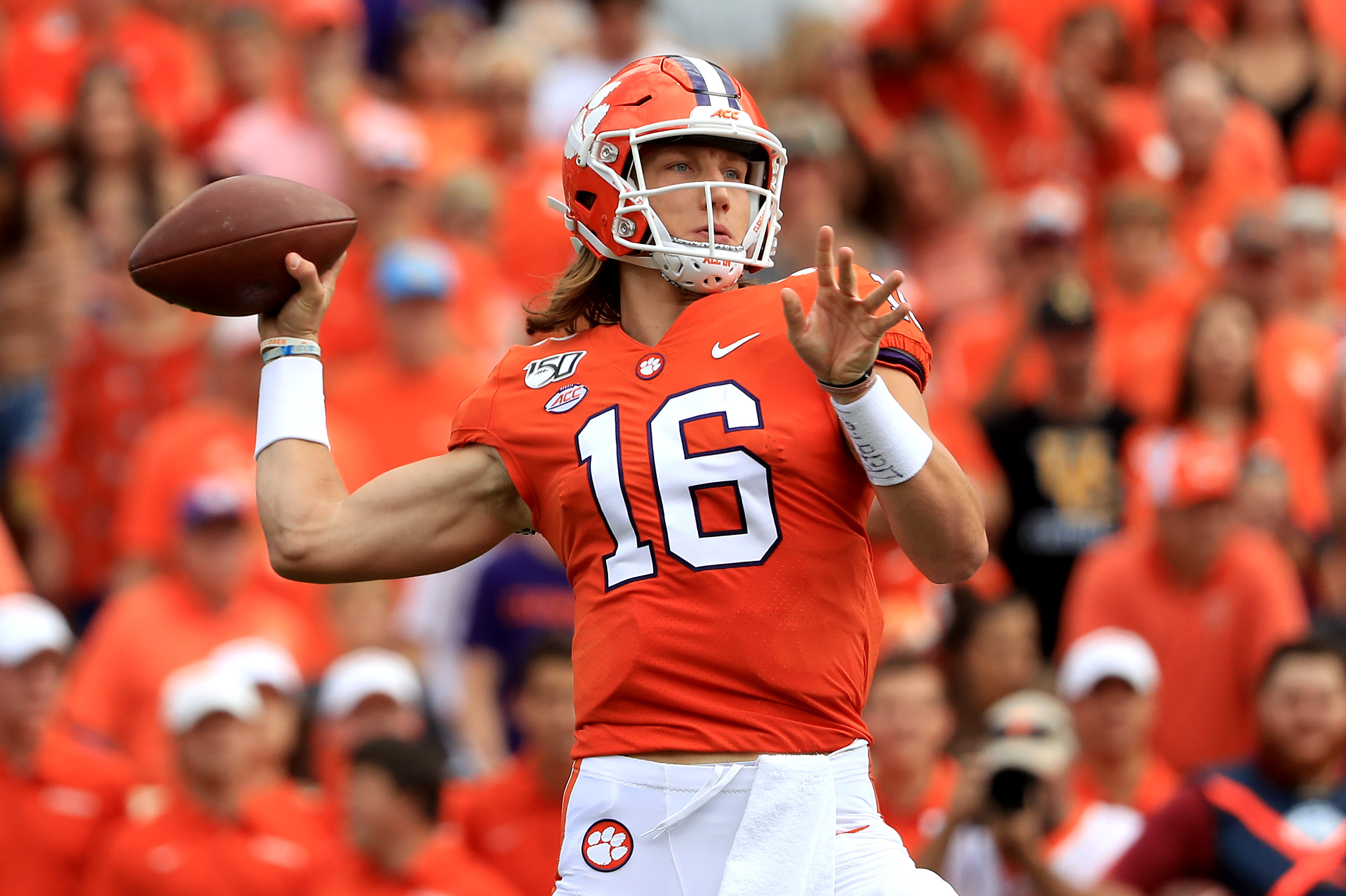 Clemson quarterback Trevor Lawrence (16) scrambles out of the pocket in the  second half of the NCAA Cotton Bowl semi-final playoff football game  against Notre Dame on Saturday, Dec. 29, 2018, in