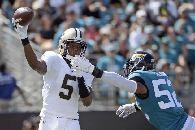 New Orleans Saints quarterback Teddy Bridgewater (5) releases a pass just before he is hit by Jacksonville Jaguars linebacker Najee Goode (52) during the first half of an NFL football game, Sunday, Oct. 13, 2019, in Jacksonville, Fla. (AP Photo/Phelan M. Ebenhack)
