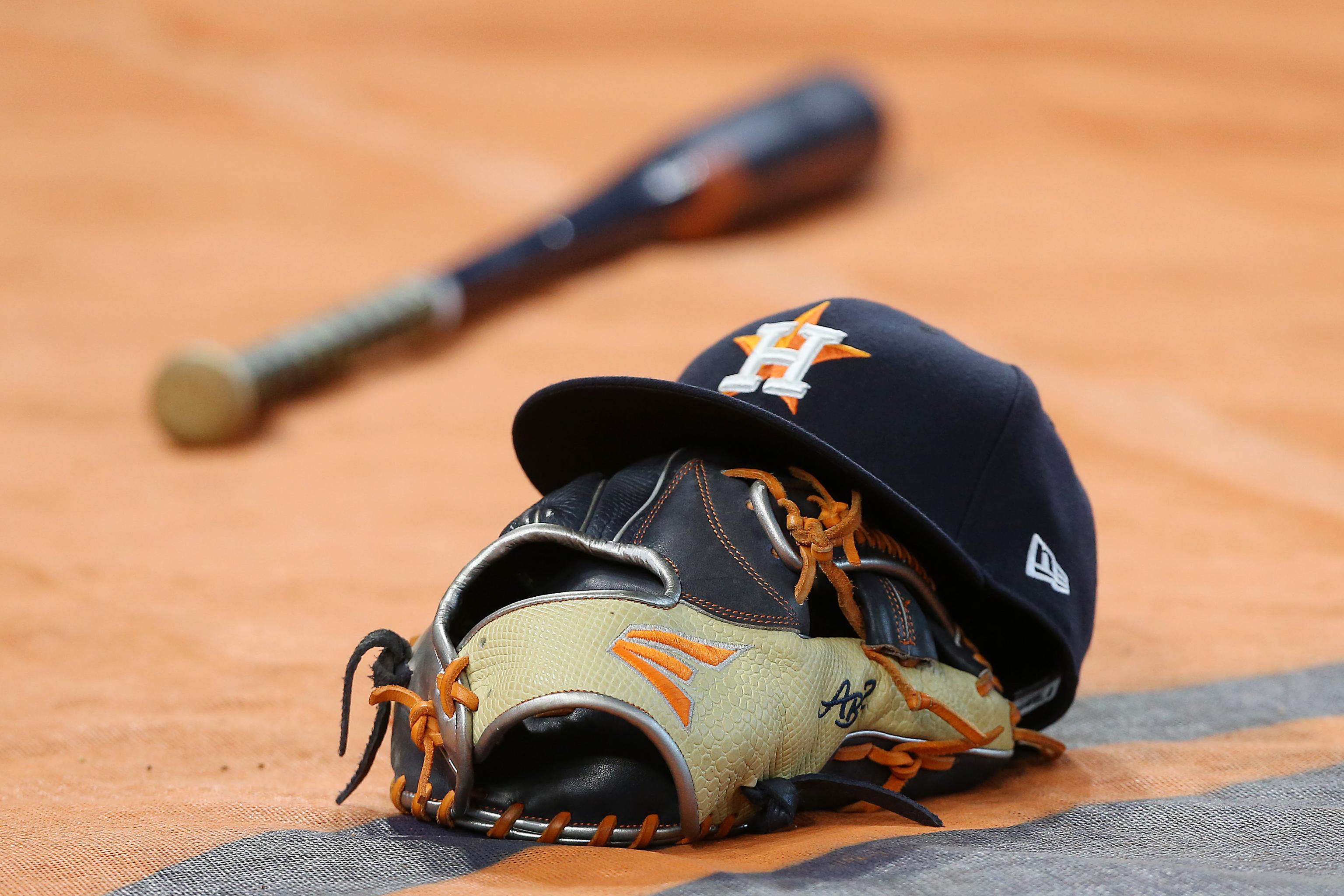 Paramedic hit by foul liner in Astros dugout hospitalized, in stable  condition