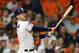 HOUSTON, TEXAS - OCTOBER 13: Carlos Correa #1 of the Houston Astros hits a walk-off solo home run during the eleventh inning against the New York Yankees to win game two of the American League Championship Series 3-2 at Minute Maid Park on October 13, 2019 in Houston, Texas. (Photo by Bob Levey/Getty Images)