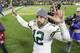 Green Bay Packers quarterback Aaron Rodgers celebrates as he walks off the field following an NFL football game against the Detroit Lions, Monday, Oct. 14, 2019, in Green Bay, Wis. Green Bay won 23-22. (AP Photo/Mike Roemer)
