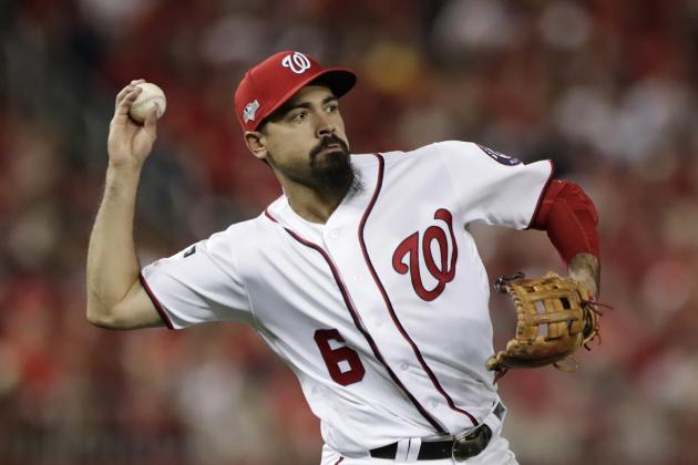 Washington Nationals third baseman Anthony Rendon throws out Los Angeles Dodgers' Max Muncy on a ground ball during the third inning in Game 3 of a baseball National League Division Series Sunday, Oct. 6, 2019, in Washington. (AP Photo/Julio Cortez)