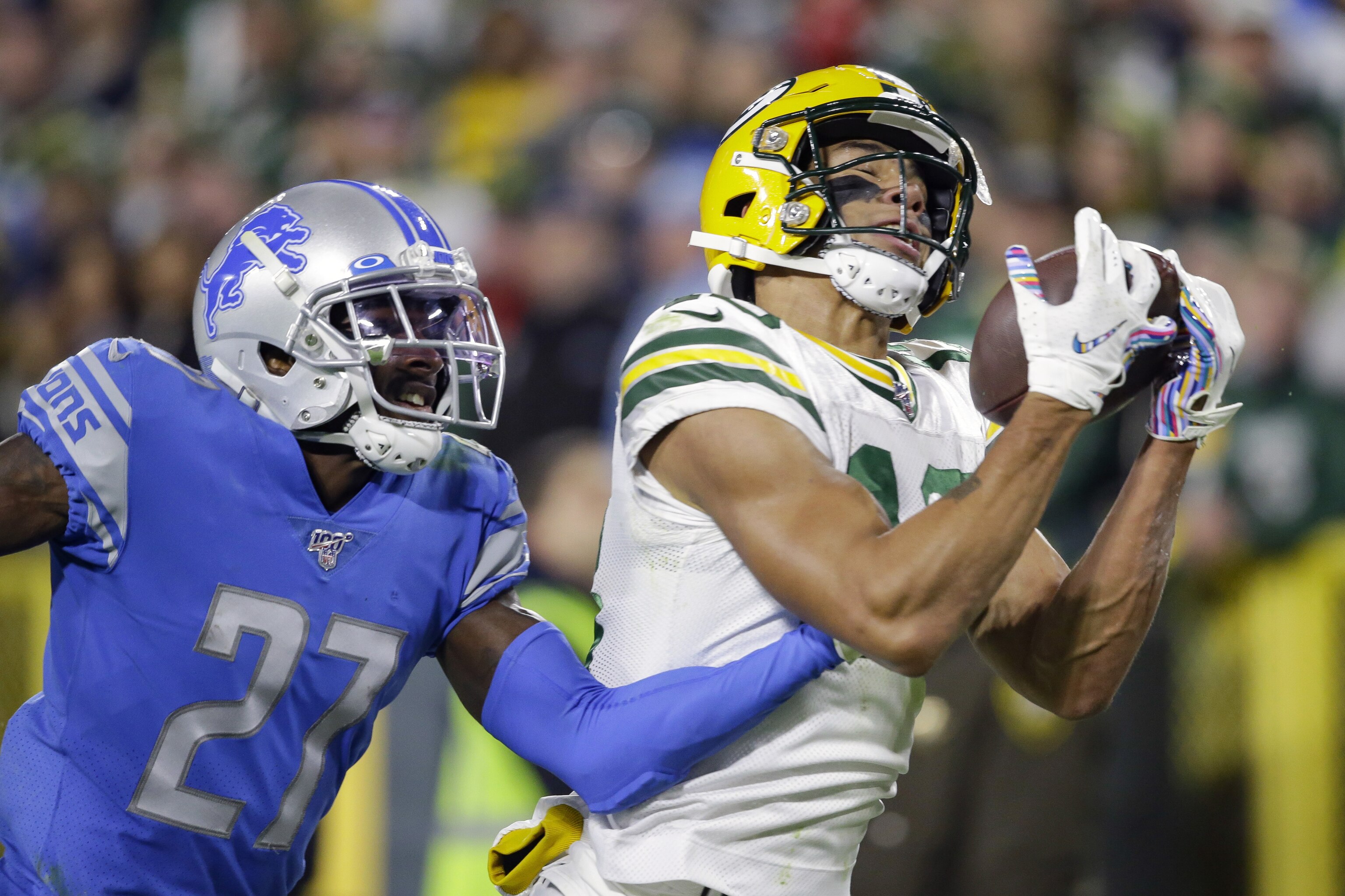 Green Bay, Wisconsin, USA. 02nd Jan, 2022. Green Bay Packers quarterback  Aaron Rodgers #12 congratulates Green Bay Packers wide receiver Allen  Lazard #13 on a touchdown during NFL football game between the