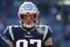 New England Patriots tight end Rob Gronkowski warms up before an NFL divisional playoff football game against the Los Angeles Chargers, Sunday, Jan. 13, 2019, in Foxborough, Mass. (AP Photo/Elise Amendola)
