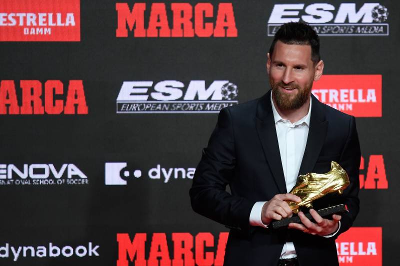 Barcelona's Argentinian forward Lionel Messi poses with his sixth Golden Shoe award after receiving the 2019 European Golden Shoe honoring the year's leading goalscorer during a ceremony at the Antigua Fabrica Estrella Damm in Barcelona on October 16, 2019. (Photo by Josep LAGO / AFP) (Photo by JOSEP LAGO/AFP via Getty Images)