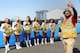 INGLEWOOD, CALIFORNIA - OCTOBER 10: A fan takes a selfie photo with the Los Angeles Chargers cheerleaders in the background at the PepsiCo SoFi Stadium and Hollywood Park Partnership Inaugural Tailgate Celebration on October 10, 2019 in Inglewood, California.  (Photo by Rich Polk/Getty Images for PepsiCo)