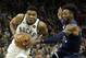 Milwaukee Bucks' Giannis Antetokounmpo, left, drives to the basket against Minnesota Timberwolves' Robert Covington during the first half of a preseason NBA basketball game Thursday, Oct. 17, 2019, in Milwaukee. (AP Photo/Aaron Gash)