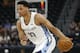 Memphis Grizzlies forward/center Ivan Rabb brings the ball up during the first half of the team's NBA summer league basketball game against the Cleveland Cavaliers on Wednesday, July 3, 2019, in Salt Lake City. (AP Photo/Rick Bowmer)