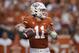 Texas's Sam Ehlinger (11) looks to pass against the Kansas during the first half of an NCAA college football game in Austin, Texas, Saturday, Oct. 19, 2019. (AP Photo/Chuck Burton)