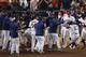 Houston Astros celebrate Jose Altuve's walk-off in Game 6 of baseball's American League Championship Series against the New York Yankees Saturday, Oct. 19, 2019, in Houston. The Astros won 6-4 to win the series 4-2. (AP Photo/Sue Ogrocki)