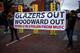 MANCHESTER, ENGLAND - OCTOBER 20: Fans of Manchester United protest against the owners of Manchester United, the Glazers and Chief Executive Ed Woodward prior to the Premier League match between Manchester United and Liverpool FC at Old Trafford on October 20, 2019 in Manchester, United Kingdom. (Photo by Robbie Jay Barratt - AMA/Getty Images)