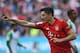 Bayern Munich's Polish striker Robert Lewandowski celebrates scoring during the German first division Bundesliga football match FC Augsburg v Bayern Munich in Augsburg, southern Germany on October 19 2019. (Photo by Christof STACHE / AFP) / RESTRICTIONS: DFL REGULATIONS PROHIBIT ANY USE OF PHOTOGRAPHS AS IMAGE SEQUENCES AND/OR QUASI-VIDEO (Photo by CHRISTOF STACHE/AFP via Getty Images)