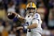 FILE - In this Oct. 12, 2019, file photo, LSU quarterback Joe Burrow (9) passes in the second half of an NCAA college football game against Florida, in Baton Rouge, La. Burrow was selected to the AP Midseason All-America NCAA college football team, Tuesday, Oct. 15, 2019. (AP Photo/Gerald Herbert)