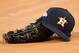 HOUSTON, TX - OCTOBER 19: A Houston Astros hat and glove are seen on the field before Game Six of the League Championship Series against the New York Yankees at Minute Maid Park on October 19, 2019 in Houston, Texas. (Photo by Tim Warner/Getty Images)