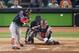 HOUSTON, TEXAS - OCTOBER 22: Juan Soto #22 of the Washington Nationals hits a two-RBI double against the Houston Astros during the fifth inning in Game One of the 2019 World Series at Minute Maid Park on October 22, 2019 in Houston, Texas. (Photo by Tim Warner/Getty Images)