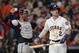 Houston Astros' Alex Bregman reacts after striking out during the ninth inning of Game 1 of the baseball World Series against the Washington Nationals Tuesday, Oct. 22, 2019, in Houston. (AP Photo/David J. Phillip)