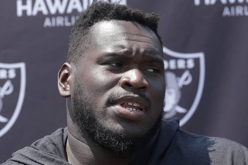 Oakland Raiders offensive guard Kelechi Osemele speaks at a news conference after an NFL football practice in Napa, Calif., Saturday, July 28, 2018. (AP Photo/Jeff Chiu)