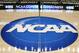 FILE - In this March 18, 2015, file photo, the NCAA logo is at center court as work continues at The Consol Energy Center in Pittsburgh, for the NCAA college basketball second and third round games. The NCAA and 11 major athletic conferences announced Friday, Feb. 3, 2017, they have agreed to pay $208.7 million to settle a federal class-action lawsuit filed by former college athletes who claimed the value of their scholarships was illegally capped. (AP Photo/Keith Srakocic, File)