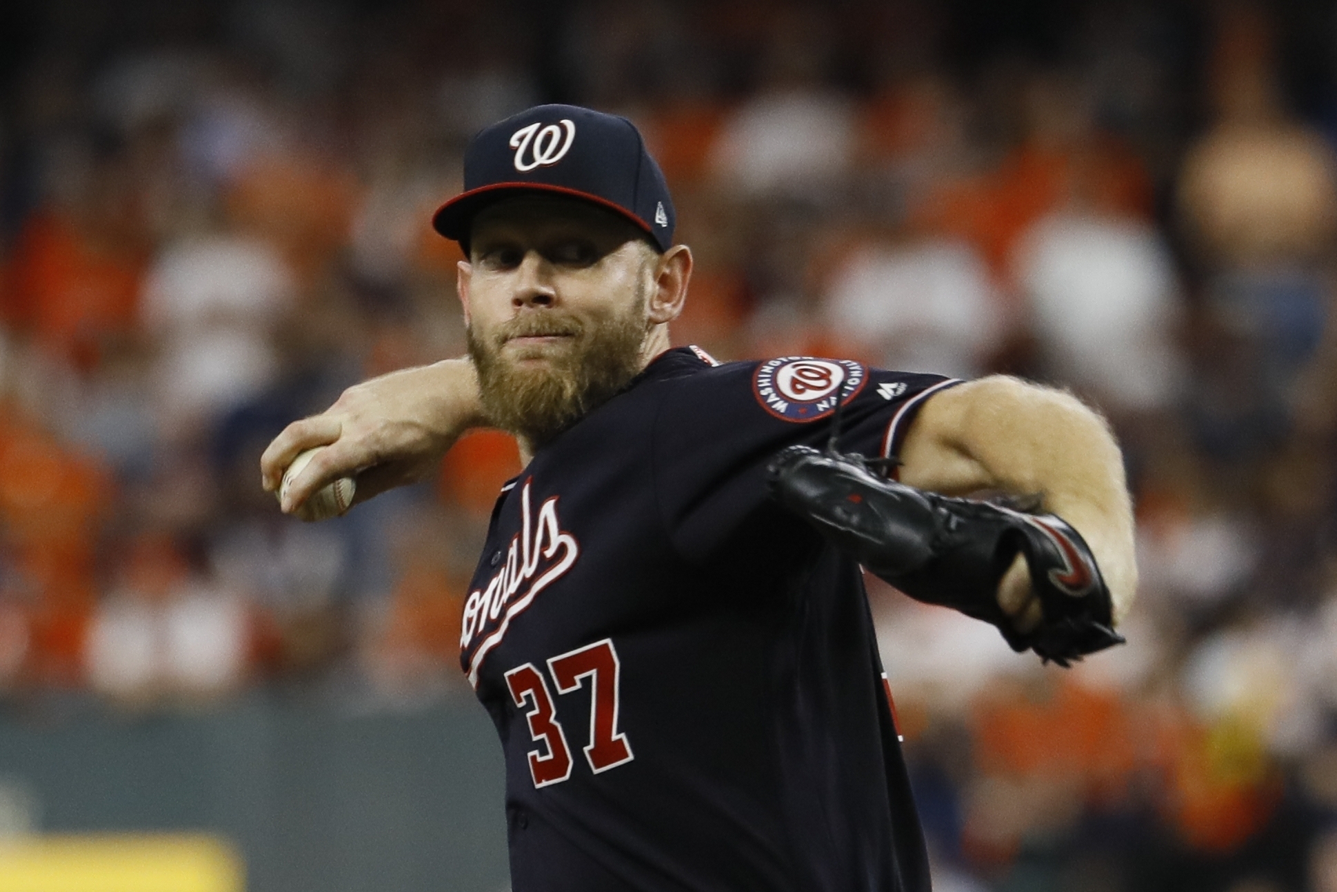 Strasburg strikes out 8, but Astros top Nationals
