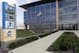 FILE - This is an April 25, 2018, file photo, showing NCAA headquarters in Indianapolis. The NCAA Board of Governors took the first step Tuesday, Oct. 29, 2019, toward allowing athletes to cash in on their fame, voting unanimously to clear the way for the amateur athletes to
