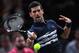 Serbia's Novak Djokovic returns the ball to Britain's Kyle Edmund during their men's singles tennis match on day four of the ATP World Tour Masters 1000 - Rolex Paris Masters - indoor tennis tournament at The AccorHotels Arena in Paris on October 31, 2019. (Photo by Christophe ARCHAMBAULT / AFP) (Photo by CHRISTOPHE ARCHAMBAULT/AFP via Getty Images)