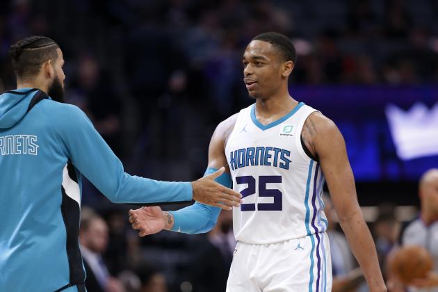Charlotte Hornets forward PJ Washingtonl right, is congratulated by teammates as he walks off the floor during a timeout in the closing moments of the Hornets' 118-111 win over the Sacramento Kings in an NBA basketball game in Sacramento, Calif., Wednesday, Oct. 30, 2019. (AP Photo/Rich Pedroncelli)