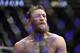 Conor McGregor reacts after losing to Khabib Nurmagomedov in a lightweight title mixed martial arts bout at UFC 229 in Las Vegas, Saturday, Oct. 6, 2018. Nurmagomedov won the fight by submission during the fourth round to retain the title. (AP Photo/John Locher)