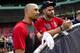 BOSTON, MA - JULY 28: Mookie Betts #50 talks with J.D. Martinez #28 of the Boston Red Sox before a game against the New York Yankees on July 28, 2019 at Fenway Park in Boston, Massachusetts. (Photo by Billie Weiss/Boston Red Sox/Getty Images)