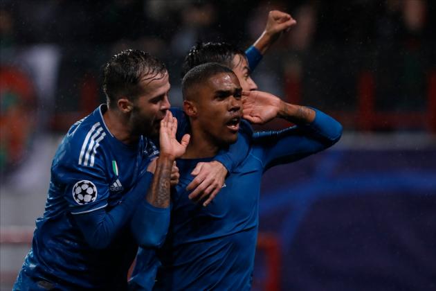 MOSCOW, RUSSIA - NOVEMBER 06: Douglas Costa (C) of Juventus celebrates his goal with Miralem Pjanic (L) and Paulo Dybala during the UEFA Champions League group D match between Lokomotiv Moskva and Juventus FC at RZD Arena on November 6, 2019 in Moscow, Russia. (Photo by Mike Kireev/MB Media/Getty Images)