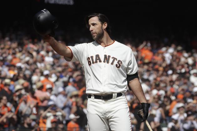 San Francisco Giants' Madison Bumgarner gestures toward fans before pinch hitting against the Los Angeles Dodgers during the fifth inning of a baseball game in San Francisco, Sunday, Sept. 29, 2019. (AP Photo/Jeff Chiu)