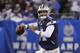 Dallas Cowboys quarterback Dak Prescott (4) rolls out of the pocket to pass during the first quarter of an NFL football game against the New York Giants, Monday, Nov. 4, 2019, in East Rutherford, N.J. (AP Photo/Adam Hunger)