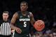 Michigan State guard Cassius Winston (5) dribbles the ball during the first half of an NCAA college basketball game against Kentucky on Tuesday, Nov. 5, 2019, in New York. (AP Photo/Adam Hunger)