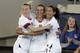 U.S. forward Carli Lloyd, center, celebrates her goal against the Costa Rica with Emily Sonnett, left, and Christen Press during the first half of an international friendly soccer match Sunday, Nov. 10, 2019, in Jacksonville, Fla. (AP Photo/John Raoux)