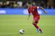 United States' Christian Pulisic in action against Cuba during the second half of a CONCACAF Nations League soccer game Friday, Oct. 11, 2019, in Washington. The U.S. won 7-0. (AP Photo/Julio Cortez)