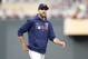 Minnesota Twins manager Rocco Baldelli returns to the dugout after a mound visit against the Oakland Athletics in a baseball game Saturday, July 20, 2019, in Minneapolis. (AP Photo/Jim Mone)