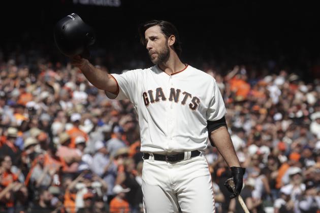 San Francisco Giants' Madison Bumgarner gestures toward fans before pinch hitting against the Los Angeles Dodgers during the fifth inning of a baseball game in San Francisco, Sunday, Sept. 29, 2019. (AP Photo/Jeff Chiu)