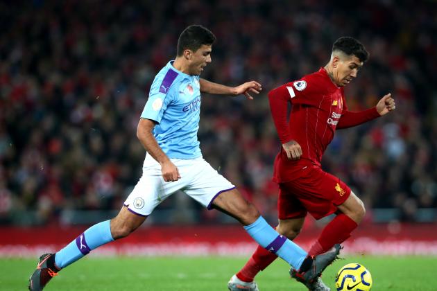 LIVERPOOL, ENGLAND - NOVEMBER 10: Rodrigo of Manchester City and Roberto Firmino of Liverpool in action during the Premier League match between Liverpool FC and Manchester City at Anfield on November 10, 2019 in Liverpool, United Kingdom. (Photo by Chloe Knott - Danehouse/Getty Images)