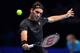 Switzerland's Roger Federer returns against Serbia's Novak Djokovic during their men's singles round-robin match on day five of the ATP World Tour Finals tennis tournament at the O2 Arena in London on November 14, 2019. (Photo by Ben STANSALL / AFP) (Photo by BEN STANSALL/AFP via Getty Images)