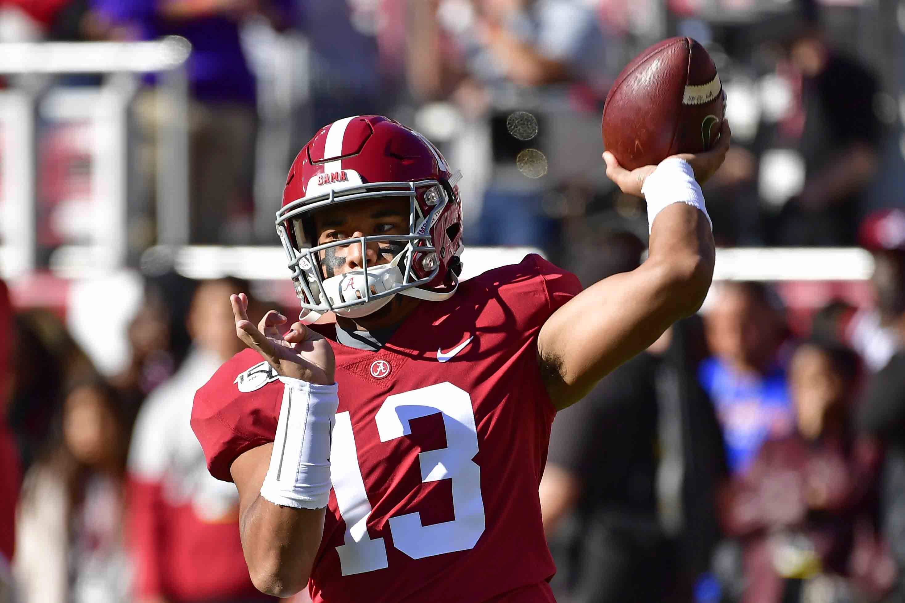 Tua looking like “Alabama Tua” with that red practice jersey