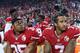 San Francisco 49ers Eric Reid (35) and Colin Kaepernick (7) take a knee during the National Anthem prior to their season opener against the Los Angeles Rams during an NFL football game Monday, Sept. 12, 2016, in Santa Clara, CA. The Niners won 28-0. (Daniel Gluskoter/AP Images for Panini)