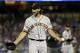 San Francisco Giants starting pitcher Madison Bumgarner argues with the home plate umpire during the third inning of a baseball game against the Los Angeles Dodgers, Tuesday, April 2, 2019, in Los Angeles. (AP Photo/Marcio Jose Sanchez)