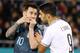 Argentina's forward Lionel Messi talks with Uruguay's forward Luis Suarez during the friendly football match between Argentina and Uruguay at the Bloomfield stadium in the Israeli coastal city of Tel Aviv on November 18, 2019. (Photo by Jack GUEZ / AFP) (Photo by JACK GUEZ/AFP via Getty Images)
