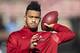 FAYETTEVILLE, AR - NOVEMBER 9: Tua Tagovailoa #13 of the Alabama Crimson Tide warms up before a game against the Mississippi State Bulldogs at Davis Wade Stadium on November 16, 2019 in Starkville, Mississippi. The Crimson Tide defeated the Bulldogs 38-7. (Photo by Wesley Hitt/Getty Images)