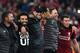 Liverpool's Egyptian midfielder Mohamed Salah (2L), Liverpool's German manager Jurgen Klopp (C) and Liverpool's Dutch defender Virgil van Dijk celebrate after winning the UEFA Champions league semi-final second leg football match between Liverpool and Barcelona at Anfield in Liverpool, north west England on May 7, 2019. (Photo by Paul ELLIS / AFP) (Photo credit should read PAUL ELLIS/AFP via Getty Images)
