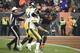 CLEVELAND, OHIO - NOVEMBER 14: Quarterback Mason Rudolph #2 of the Pittsburgh Steelers fights with defensive end Myles Garrett #95 of the Cleveland Browns during the second half at FirstEnergy Stadium on November 14, 2019 in Cleveland, Ohio. The Browns defeated the Steelers 21-7. (Photo by Jason Miller/Getty Images)