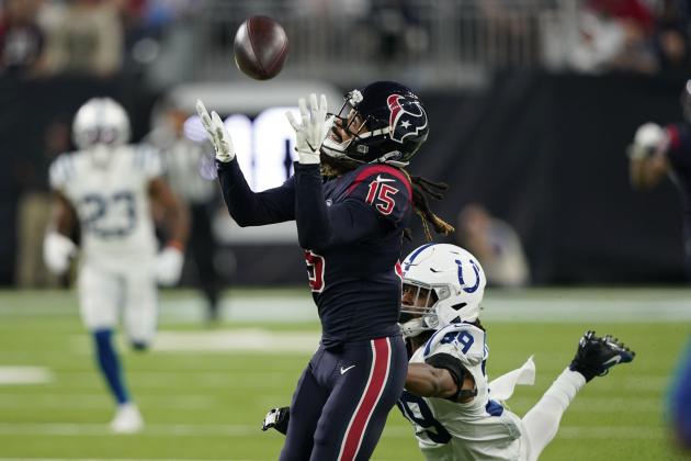 Houston Texans wide receiver Will Fuller (15) makes a catch over Indianapolis Colts cornerback Marvell Tell (39) during the second half of an NFL football game Thursday, Nov. 21, 2019, in Houston. (AP Photo/David J. Phillip)