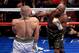 LAS VEGAS, NV - AUGUST 26: (R-L) Floyd Mayweather Jr. throws a punch at Conor McGregor during their super welterweight boxing match on August 26, 2017 at T-Mobile Arena in Las Vegas, Nevada. (Photo by Sean M. Haffey/Getty Images)